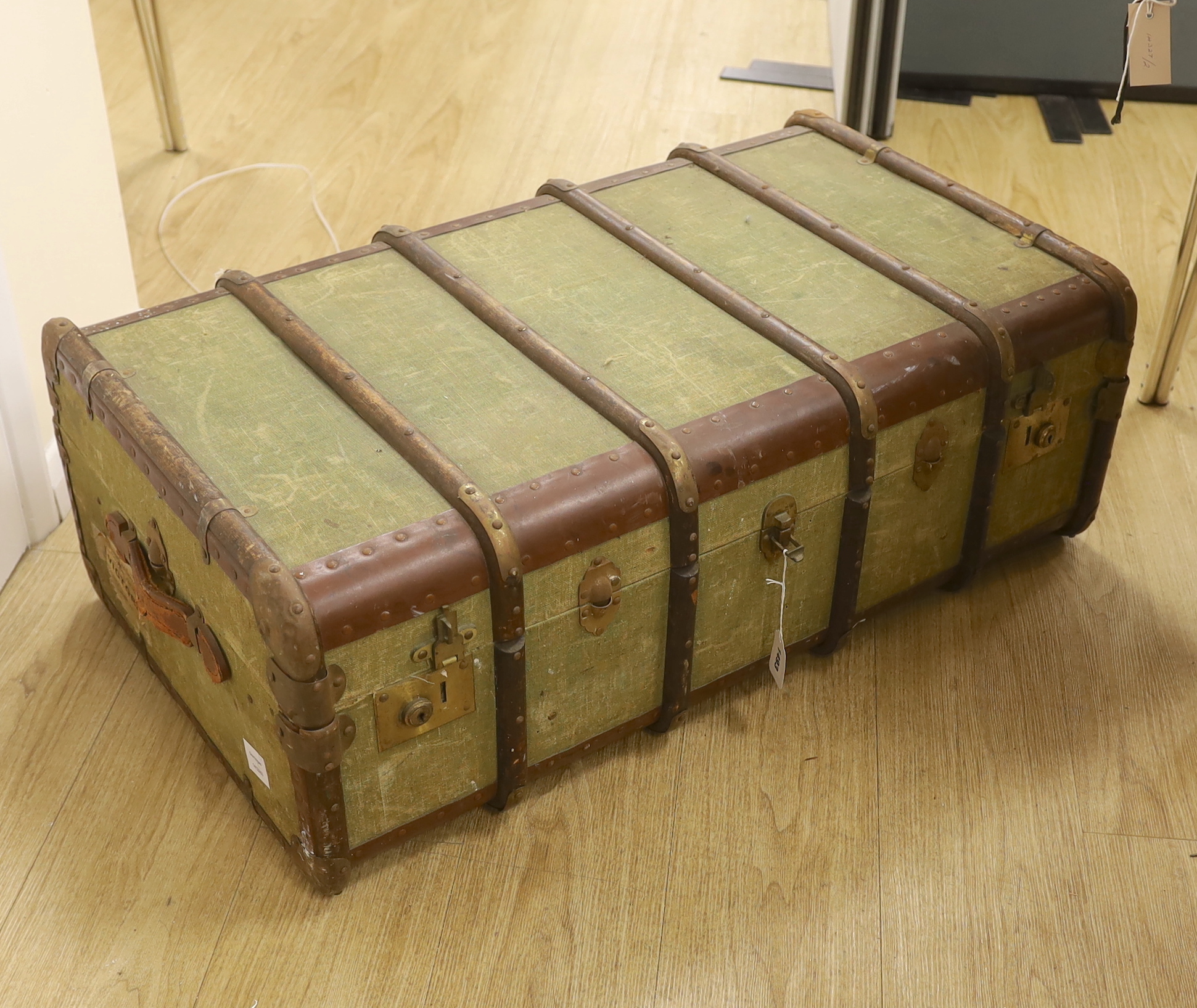 A steamer trunk and a leather Gladstone bag, trunk 63cm wide